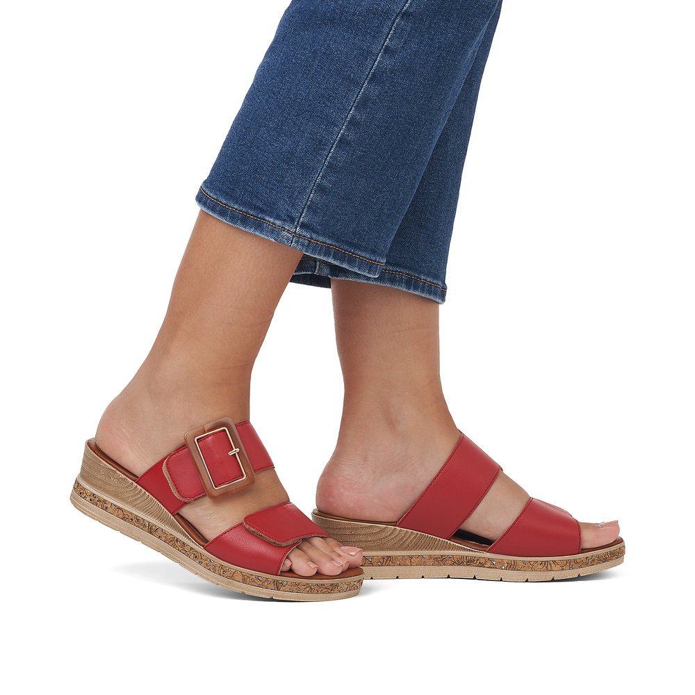 Red remonte women´s mules D3068-33 with hook and loop fastener and soft cover sole. Shoe on foot.