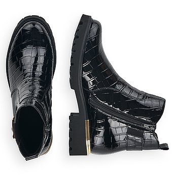 Schwarze Stiefeletten leicht wärmend aus Kunstlack mit Reißverschluss und Wechselfußbett. Schuhe Innenseite.