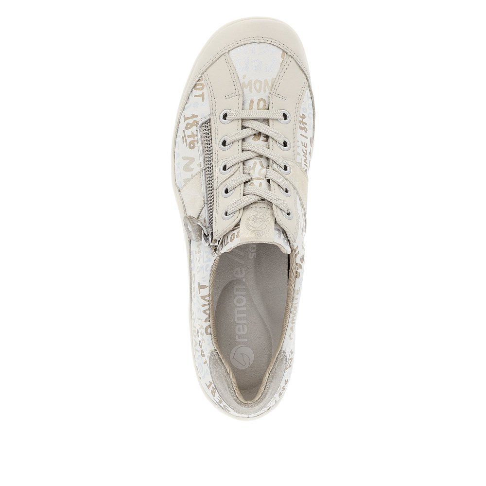 Beige remonte women´s lace-up shoes R3403-61 with a zipper and text pattern. Shoe from the top.