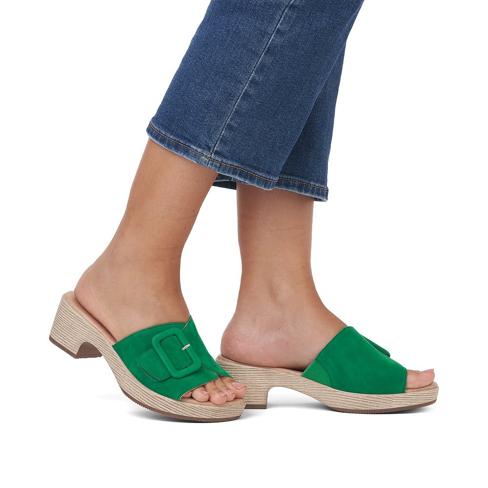 Emerald green remonte women´s mules D0N56-52 with hook and loop fastener. Shoe on foot.