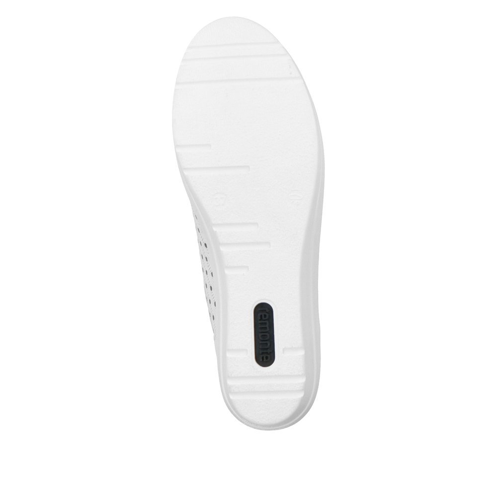 White remonte women´s sneakers R7217-80 with a lacing and perforated look. Outsole of the shoe.