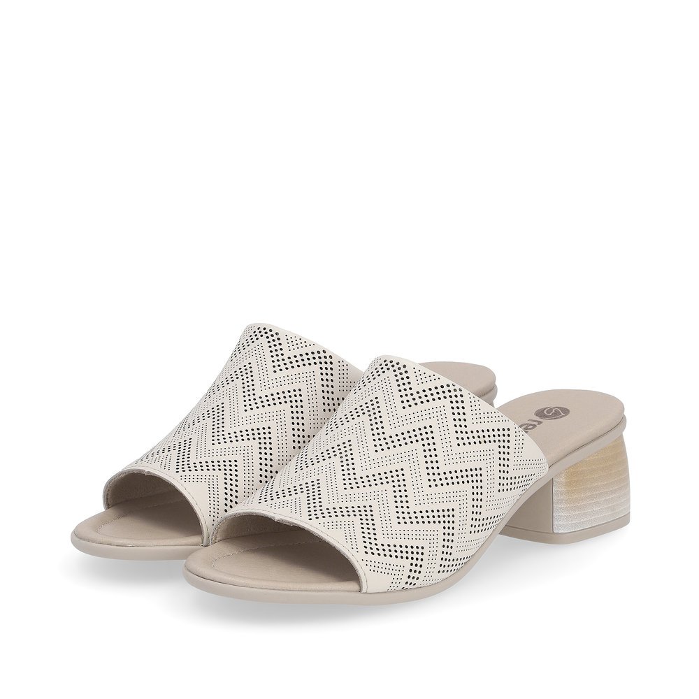 Beige remonte women´s mules R8775-60 with zigzag pattern. Shoes laterally.