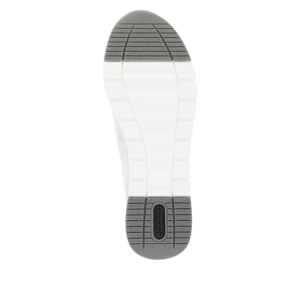 Silver remonte women´s sneakers R6700-91 with a zipper and washed-out pattern. Outsole of the shoe.
