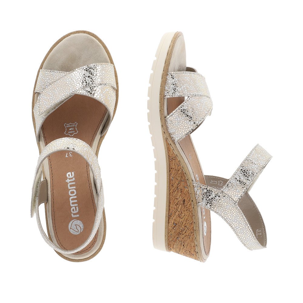 Metallic silver remonte women´s wedge sandals R6252-91 with hook and loop fastener. Shoe from the top, lying.