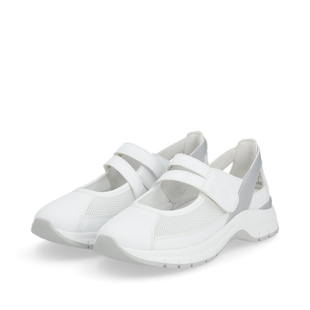 Pure white remonte women´s slippers D0G08-80 with a hook and loop fastener. Shoes laterally.
