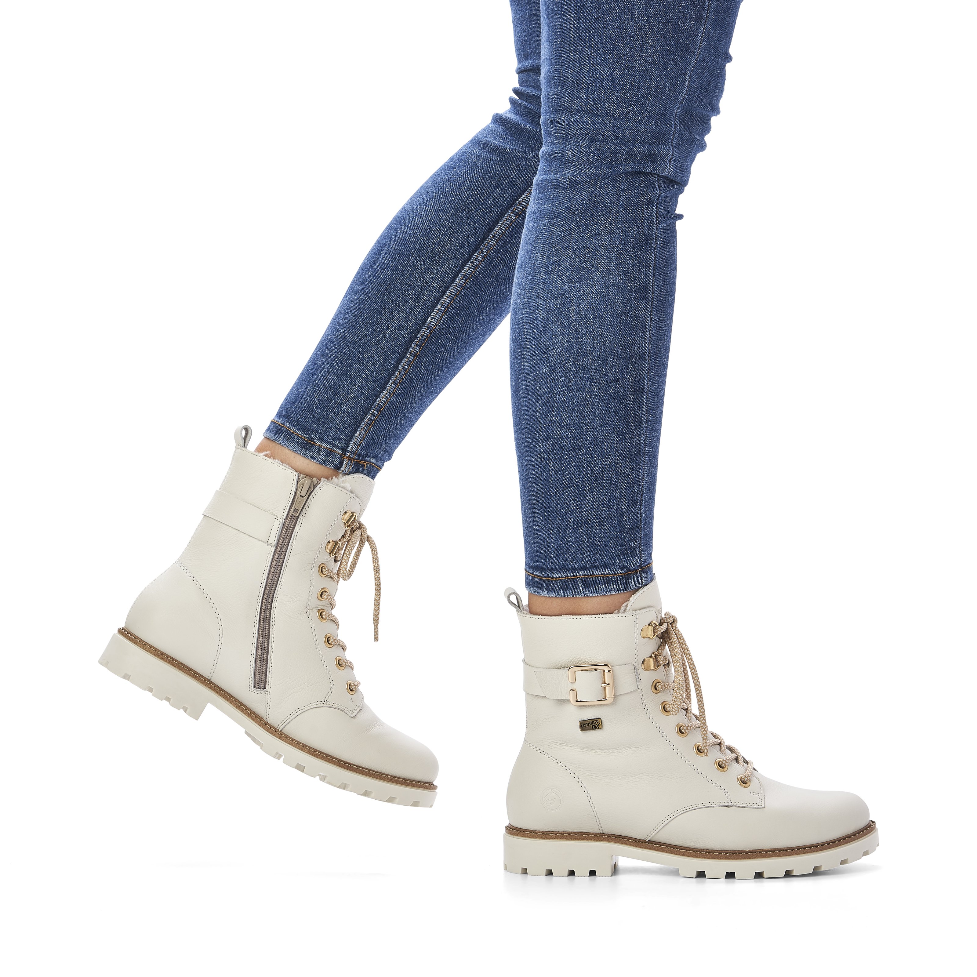 Off-white remonte women´s lace-up boots D8475-80 with flexible profile sole. Shoe on foot