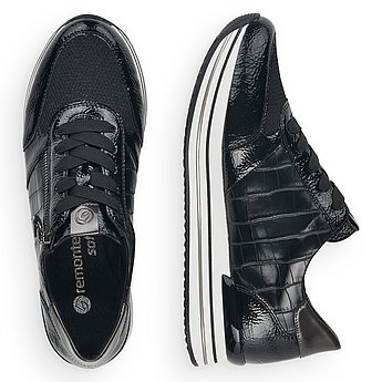 Schwarze Halbschuhe aus Kunstlack mit Reißverschluss und Schnürung und Wechselfußbett. Schuhe Innenseite.