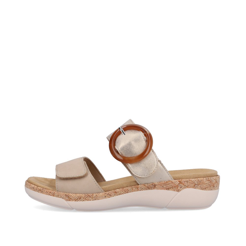 Champagne-colored remonte women´s mules R6858-60 with a hook and loop fastener. Outside of the shoe.
