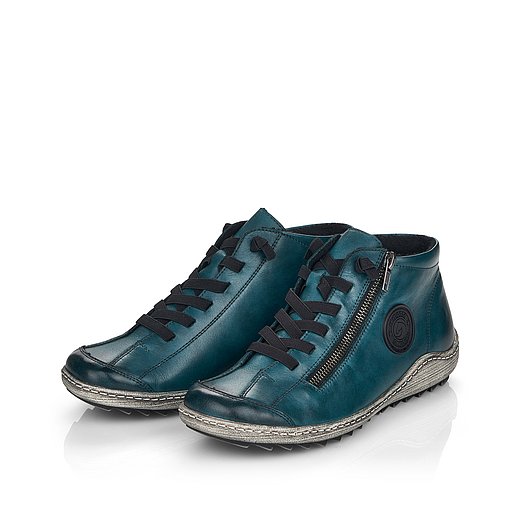 Blaue Kurzstiefel leicht wärmend aus Glattleder mit Reißverschluss und Schnürung und Wechselfußbett. Schuhe seitlich schräg. 