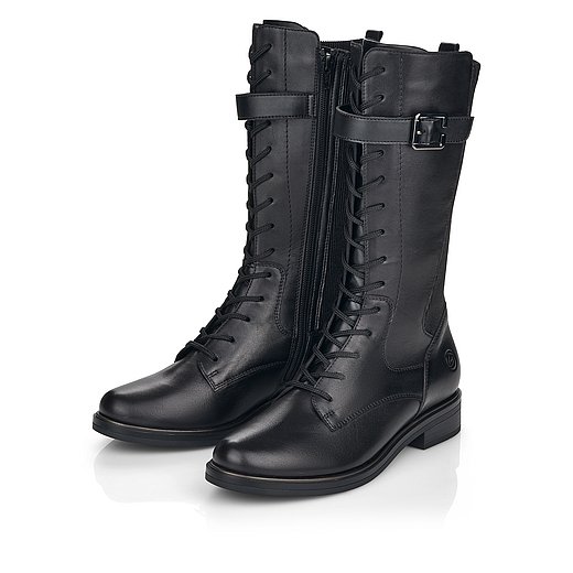 Schwarze Stiefel leicht wärmend aus Glattleder mit Reißverschluss und Schnürung, Stretch-Einsatz im Wadenbereich und Wechselfußbett. Schuhe seitlich schräg. 