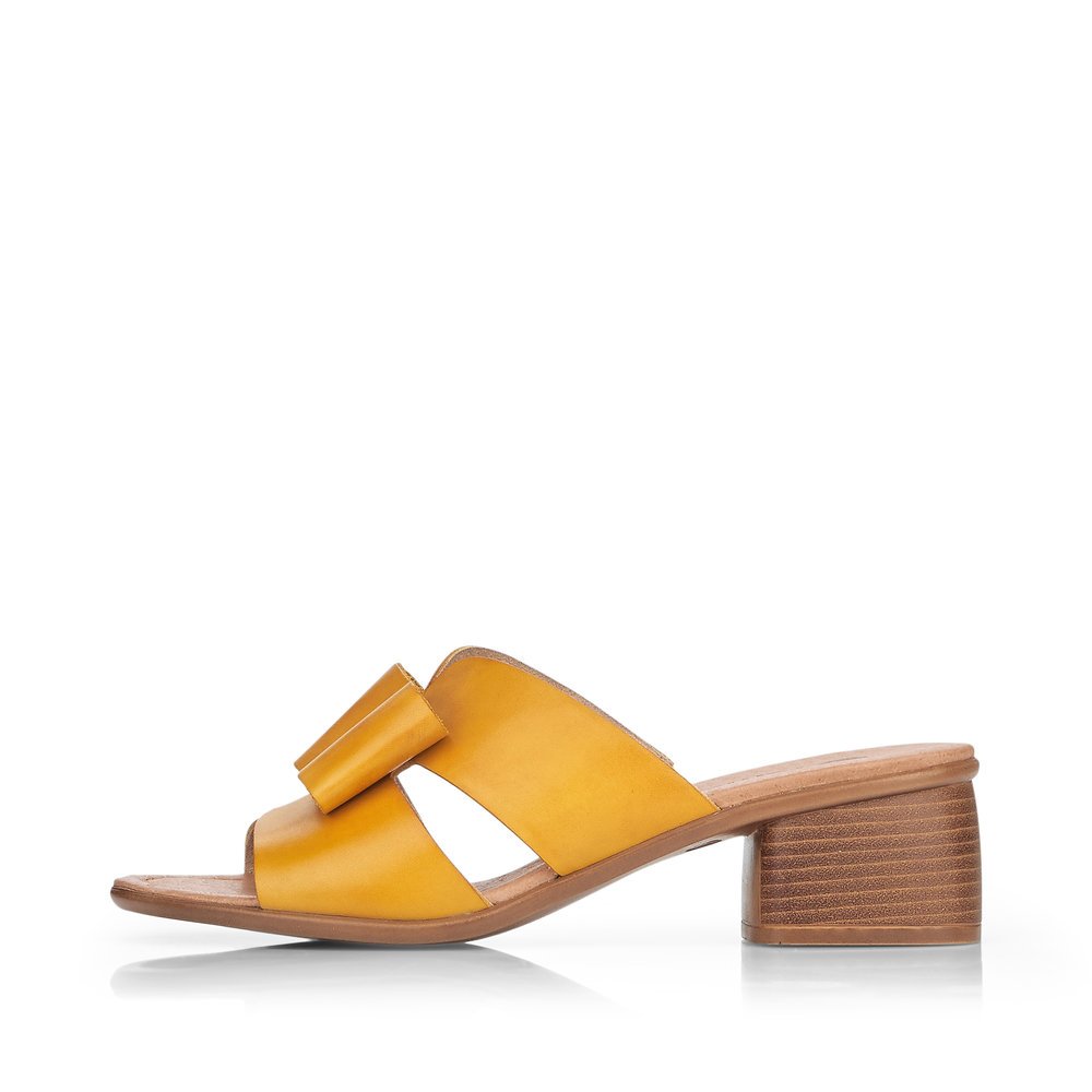 Yellow remonte women´s mules R8759-68 with feminine bow. Outside of the shoe.