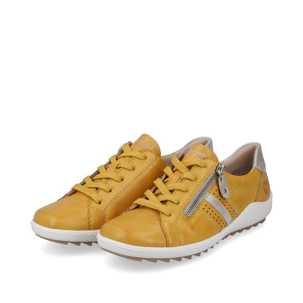 Yellow remonte women´s lace-up shoes R1432-68 with a zipper and holes on the side. Shoes laterally.