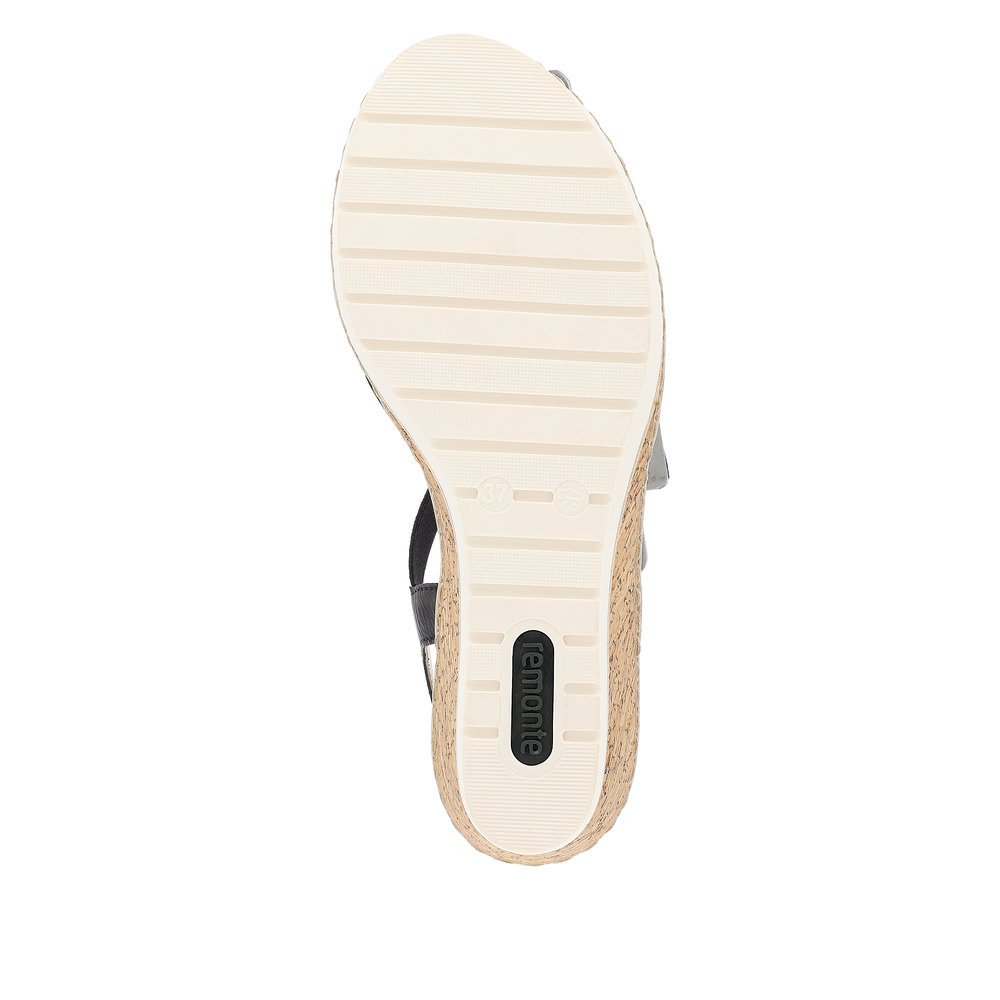 remonte sandales compensées noires femmes R6264-02 avec insert élastique. Semelle extérieure de la chaussure.