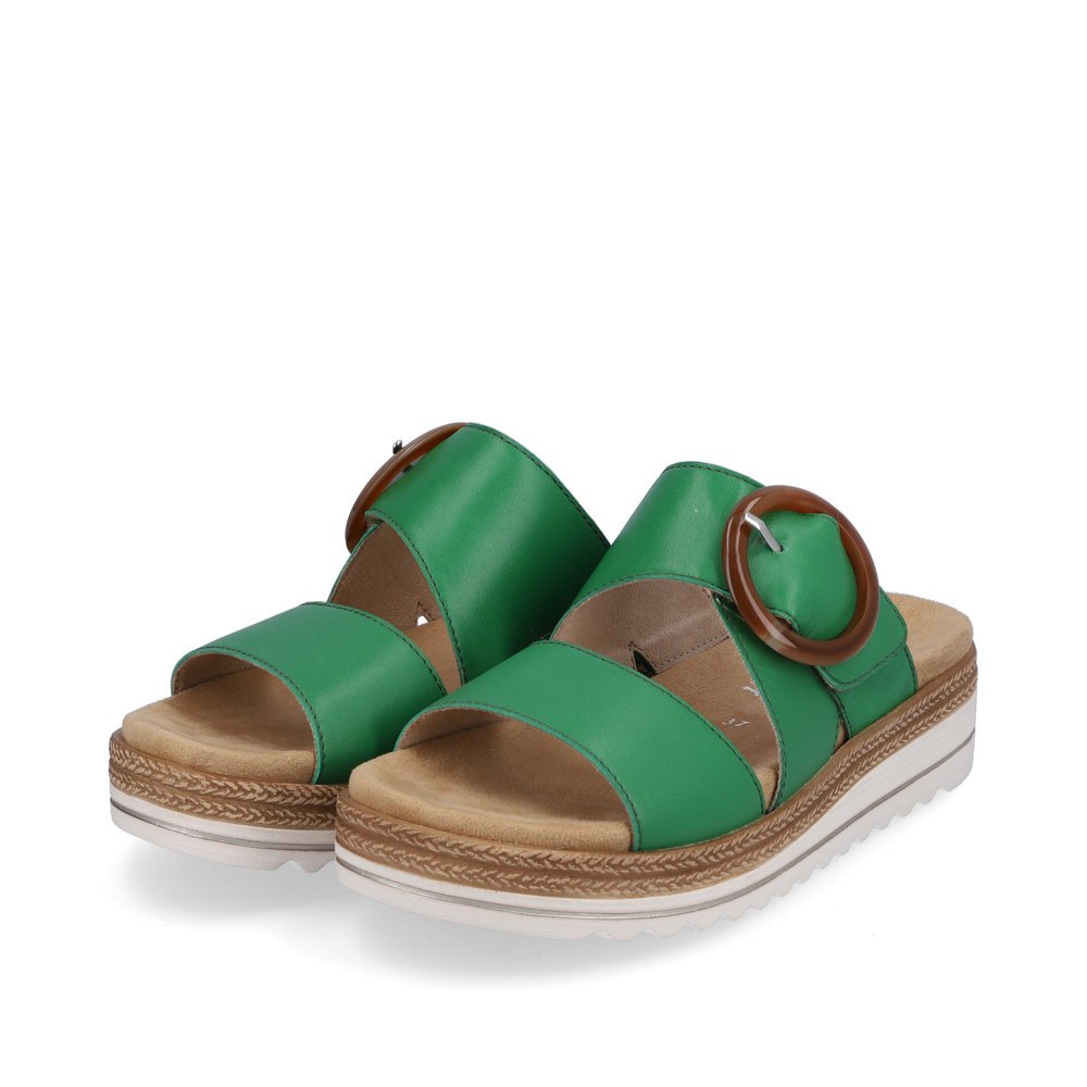 Emerald green remonte women´s mules D0Q51-52 with a hook and loop fastener. Shoes laterally.