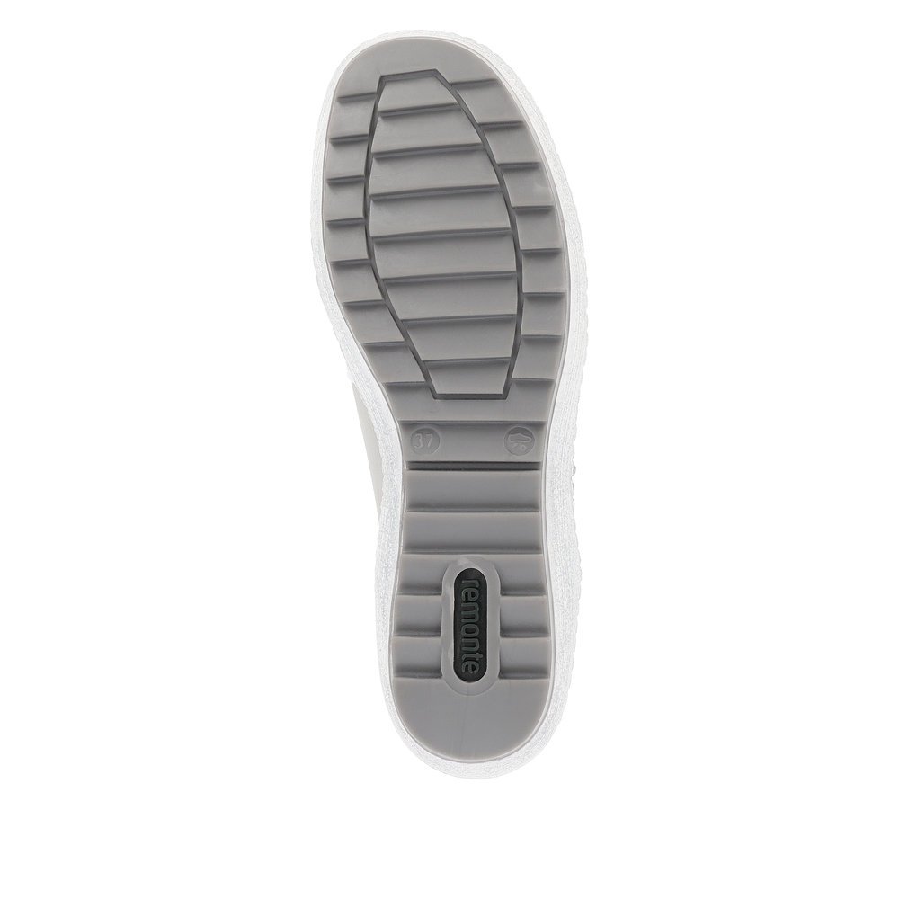 White remonte women´s slippers R1428-80 with a zipper and text pattern in silver. Outsole of the shoe.