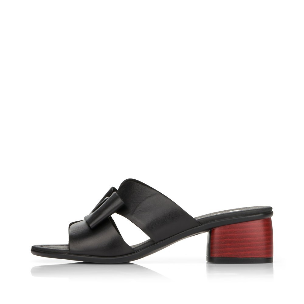 Night black remonte women´s mules R8759-01 with feminine bow. Outside of the shoe.