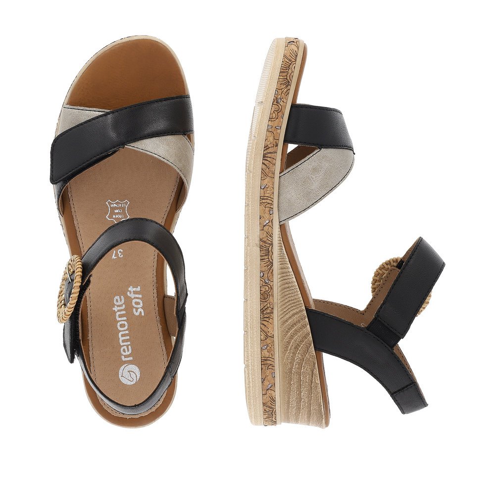 Black remonte women´s wedge sandals D3067-02 with a hook and loop fastener. Shoe from the top, lying.