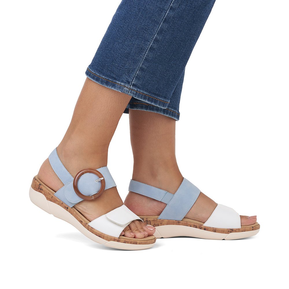 Blue remonte women´s strap sandals R6853-10 with hook and loop fastener. Shoe on foot.