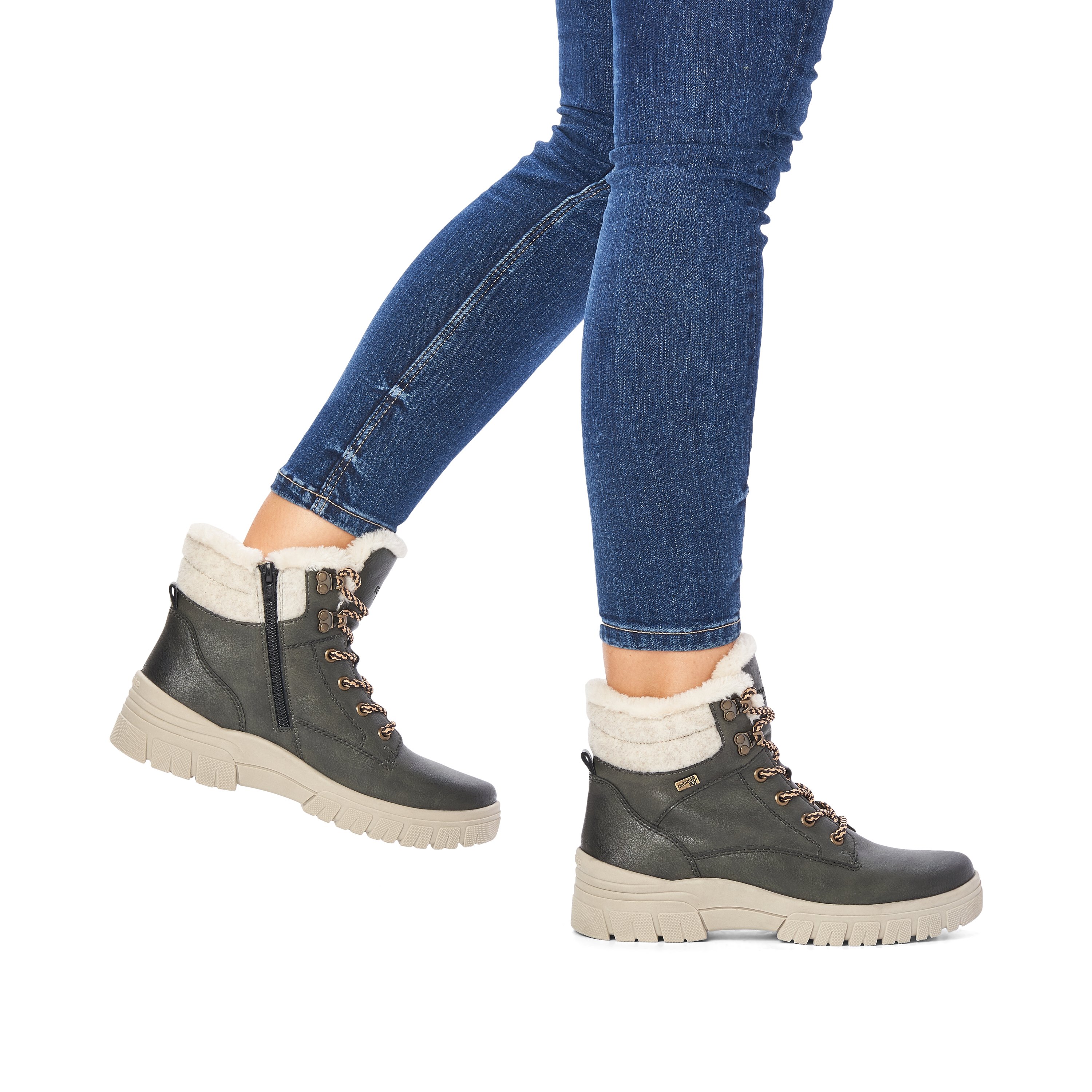 Green-grey remonte women´s lace-up boots D0E71-52 with light profile sole. Shoe on foot