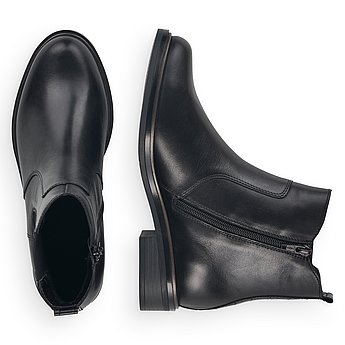 Schwarze Stiefeletten aus Glattleder mit Reißverschluss und Wechselfußbett. Schuhe Innenseite.
