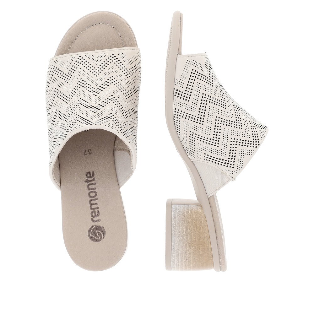 Beige remonte women´s mules R8775-60 with zigzag pattern. Shoe from the top, lying.
