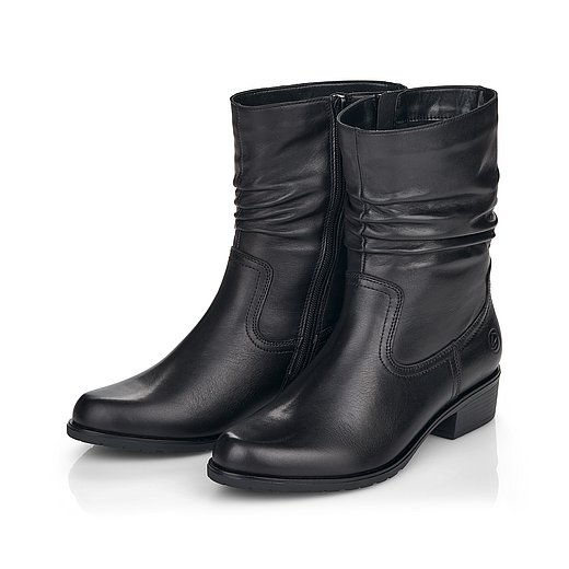Schwarze Stiefeletten leicht wärmend aus Glattleder mit Reißverschluss und Wechselfußbett. Schuhe seitlich schräg. 