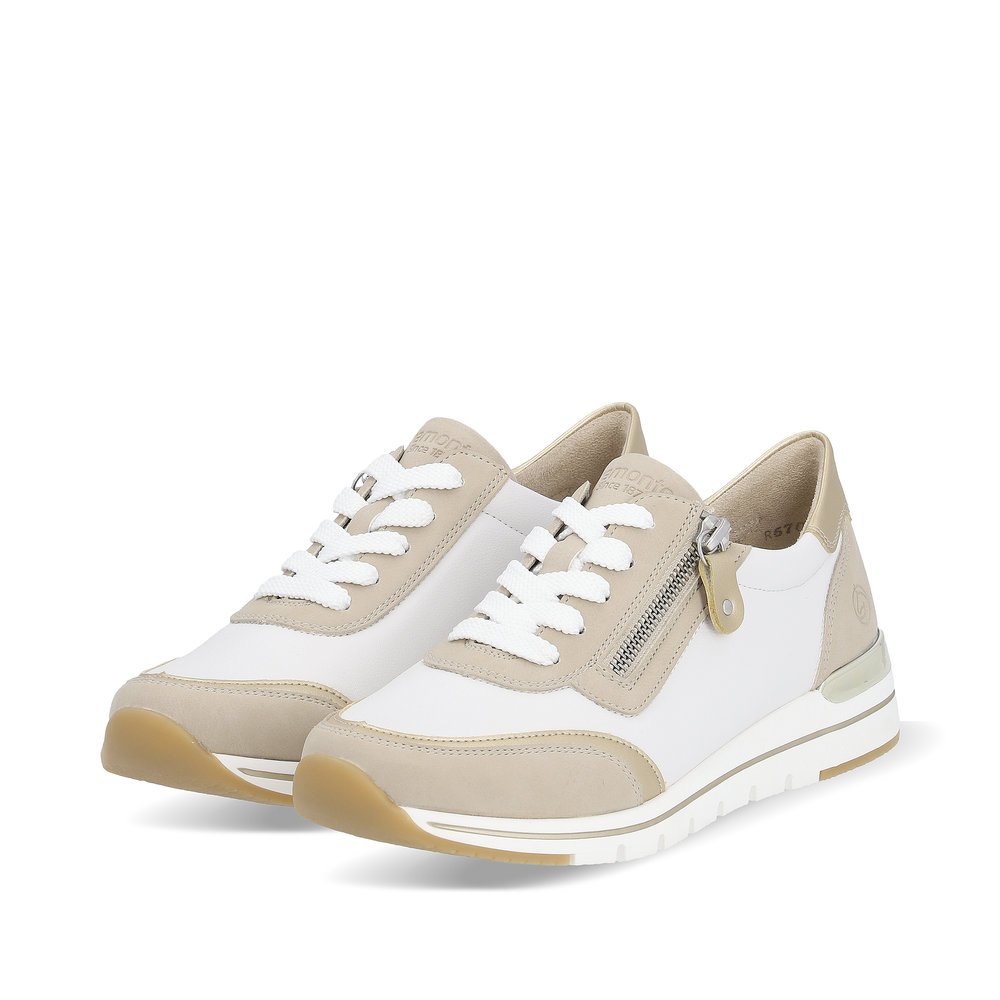 White vegan remonte women´s sneakers R6709-80 with a zipper and comfort width G. Shoes laterally.