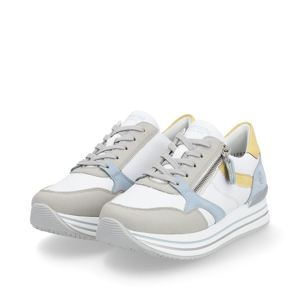White remonte women´s sneakers D1323-81 with a zipper and comfort width G. Shoes laterally.