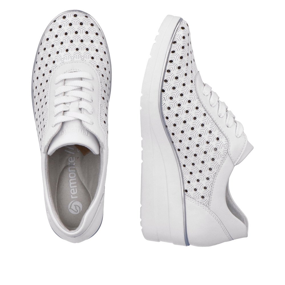White remonte women´s sneakers R7217-80 with a lacing and perforated look. Shoe from the top, lying.