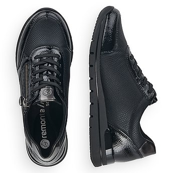 Schwarze Halbschuhe aus Lederimitat mit Reißverschluss und Schnürung und Wechselfußbett. Schuhe Innenseite.