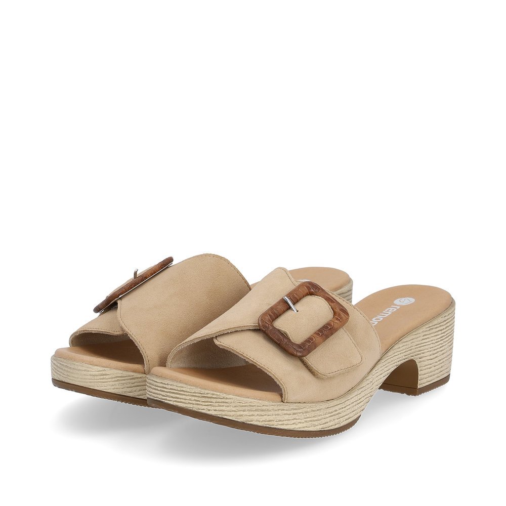 Clay beige remonte women´s mules D0N56-60 with a hook and loop fastener. Shoes laterally.