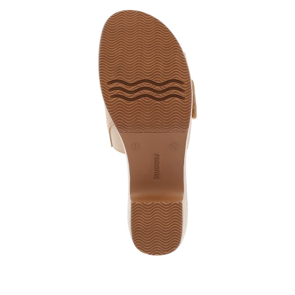 Clay beige remonte women´s mules D0N56-60 with a hook and loop fastener. Outsole of the shoe.