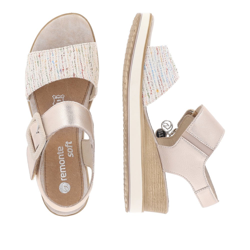 Metallic pink remonte women´s wedge sandals D6453-31 with a hook and loop fastener. Shoe from the top, lying.