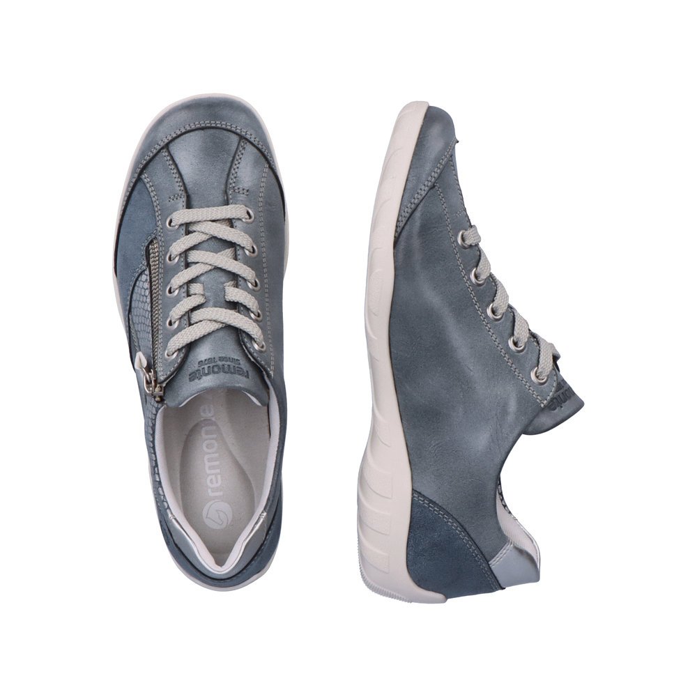 Pacific blue remonte women´s lace-up shoes R3410-14 with zipper and white pattern. Shoe from the top, lying.