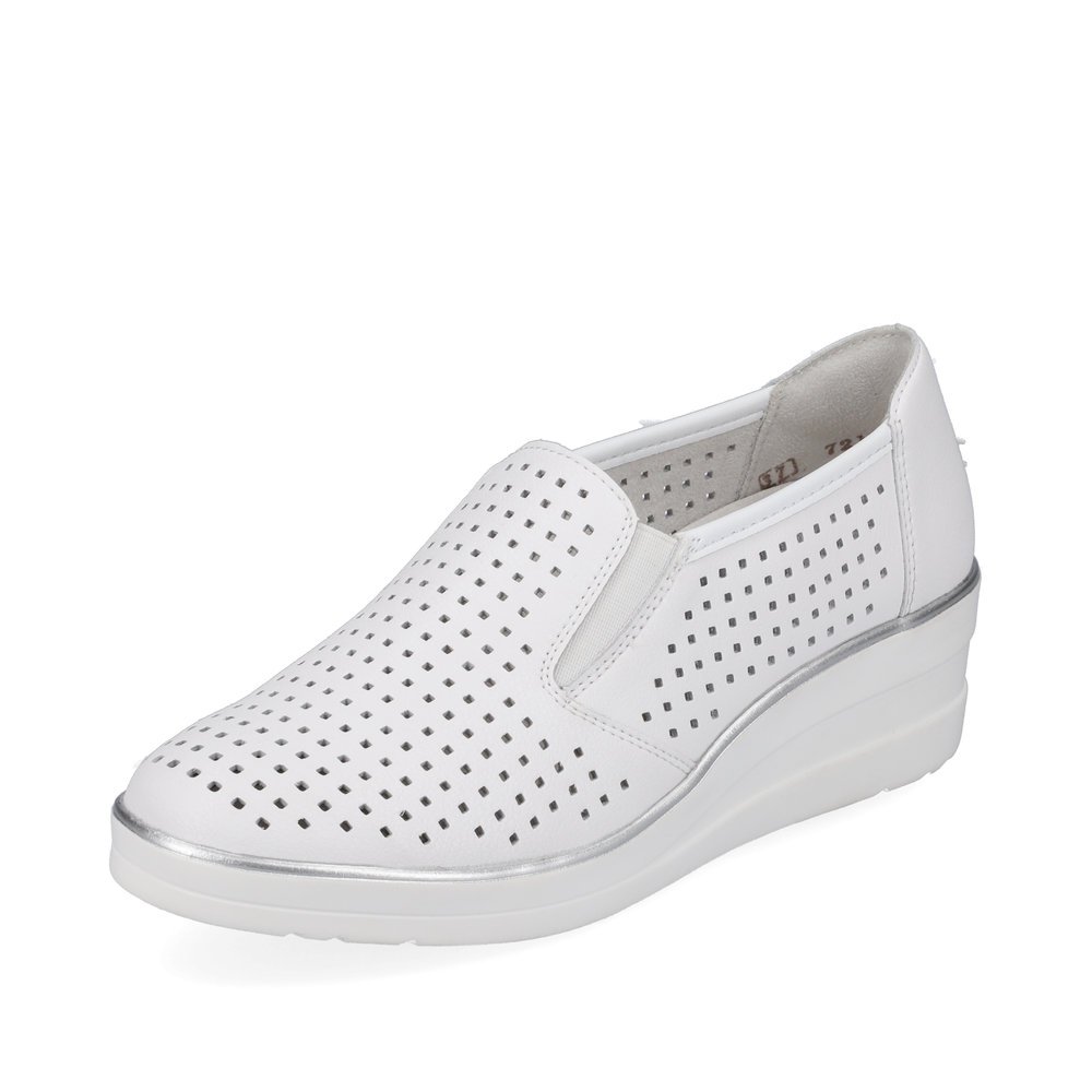 White remonte women´s slippers R7218-80 with an elastic insert and perforated look. Shoe laterally.