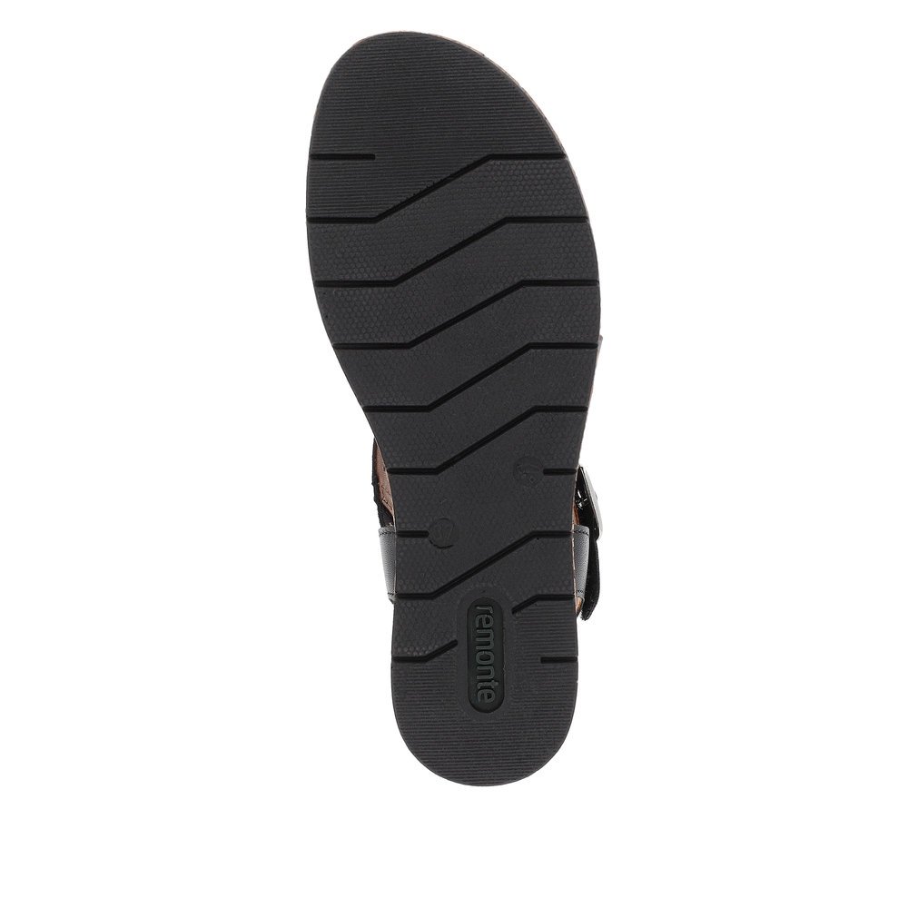 Night black remonte women´s wedge sandals D3069-02 with a hook and loop fastener. Outsole of the shoe.