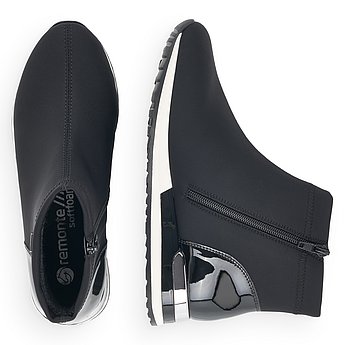 Schwarze Stiefeletten aus Kunstleder mit Reißverschluss, wasserabweisendem Remonte TEX und Wechselfußbett. Schuhe Innenseite.