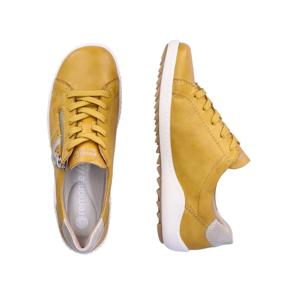 Yellow remonte women´s lace-up shoes R1432-68 with a zipper and holes on the side. Shoe from the top, lying.