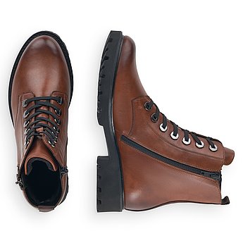 Braune Stiefeletten aus Glattleder mit Reißverschluss und Schnürung und Wechselfußbett. Schuhe Innenseite.