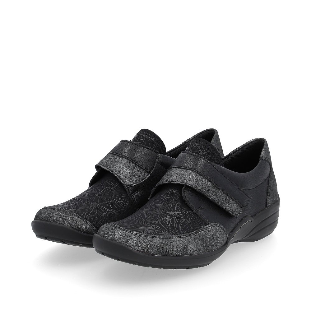 Black remonte women´s slippers R7600-05 with a hook and loop fastener. Shoes laterally.