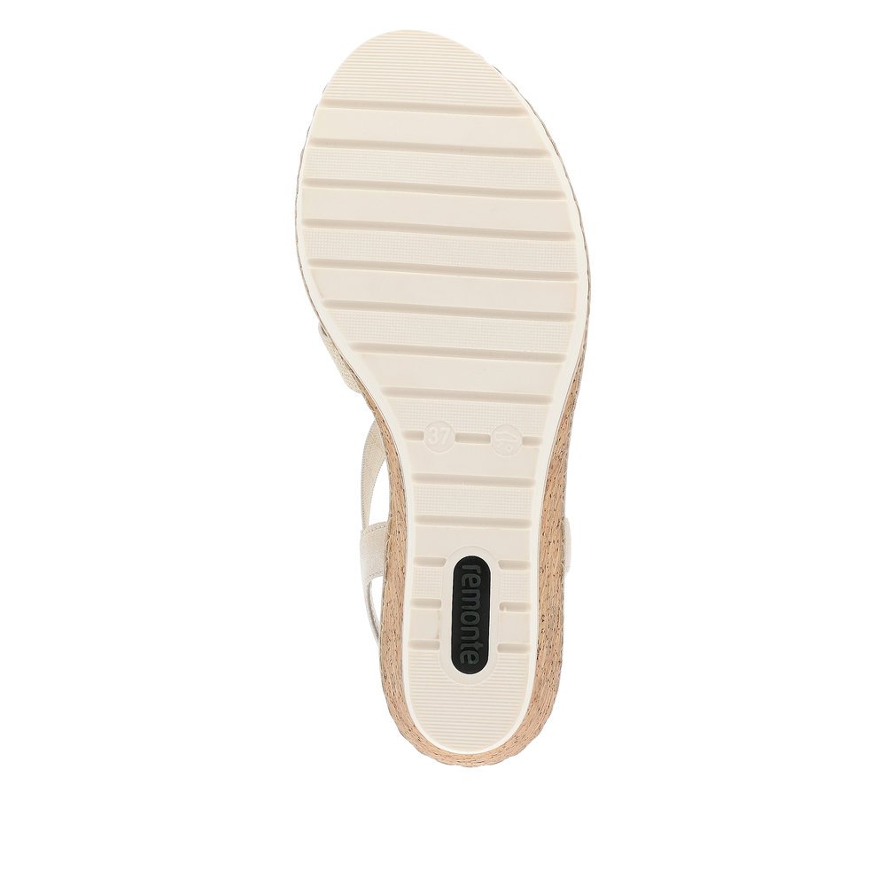 remonte sandales compensées or femmes R6264-90 avec un insert élastique. Semelle extérieure de la chaussure.