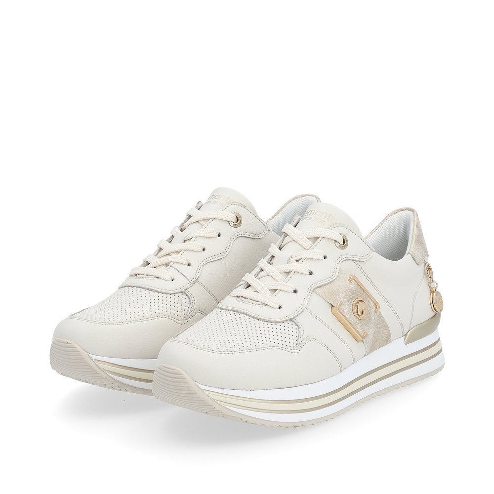 Off-white remonte women´s sneakers D1322-60 with lacing and metal element. Shoes laterally.