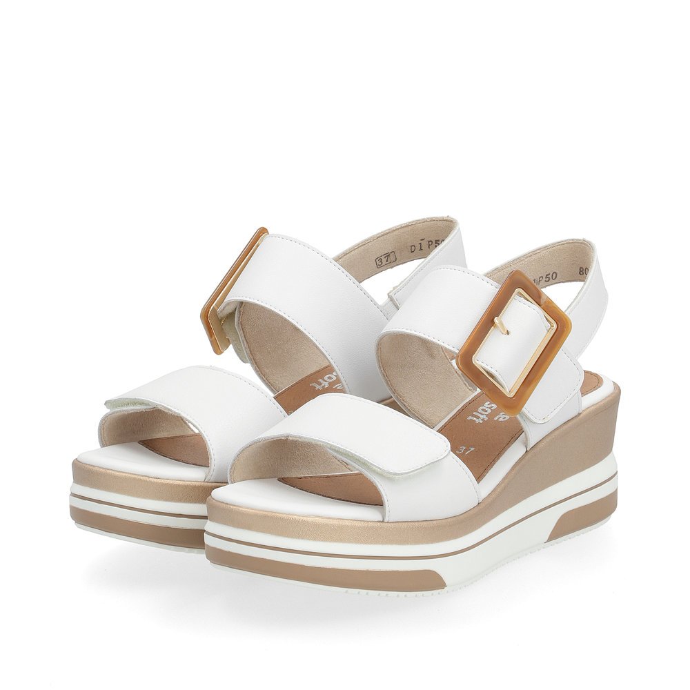 Pure white remonte women´s wedge sandals D1P50-80 with a hook and loop fastener. Shoes laterally.
