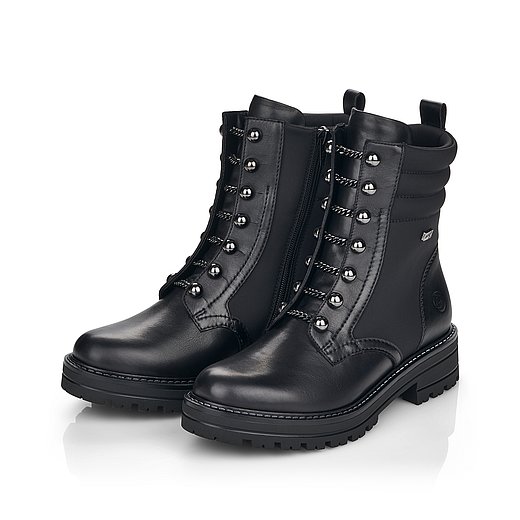 Schwarze Stiefeletten leicht wärmend aus Glattleder und Textil mit Reißverschluss, wasserabweisendem Remonte TEX und Wechselfußbett. Schuhe seitlich schräg. 