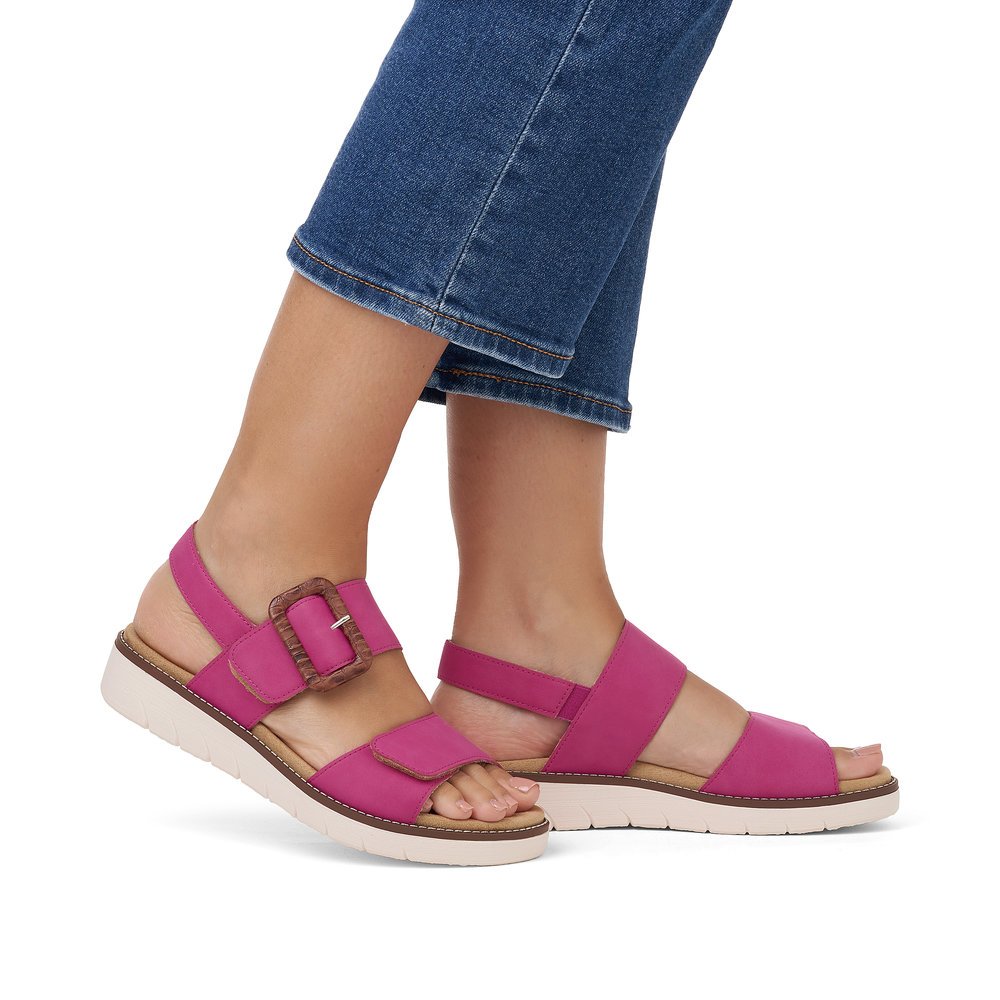 Pink remonte women´s strap sandals D2067-31 with a hook and loop fastener. Shoe on foot.