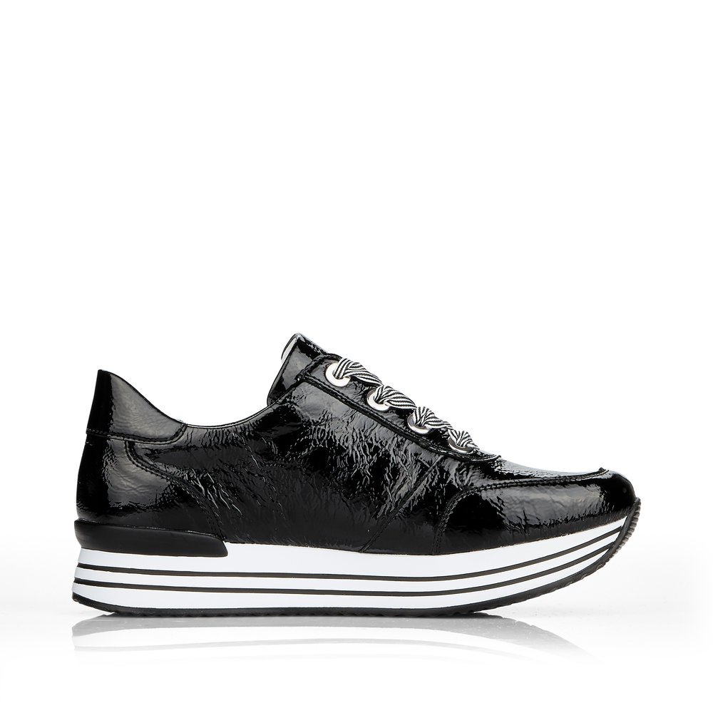 Schwarze remonte Damen Sneaker D1302-02 mit Reißverschluss sowie Sohlenmuster. Schuh Innenseite.