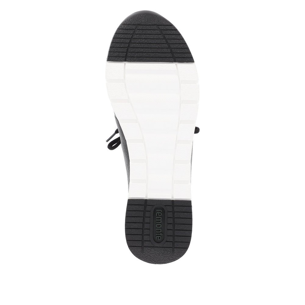 Black remonte women´s slippers R6710-00 with elastic insert and comfort width G. Outsole of the shoe.
