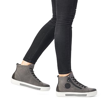 Graue Stiefeletten aus Rauhleder mit Reißverschluss und Schnürung, Lite'n Soft Technologie, ultraleichter und rutschfester Laufsohle, extra weicher Komfort Einlegesohle und Wechselfußbett. Schuhe am Fuß.