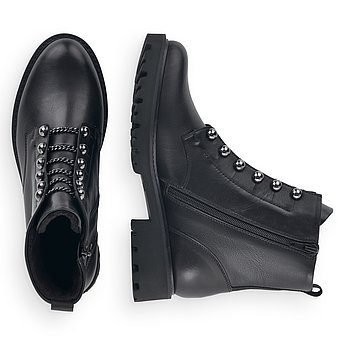 Schwarze Stiefeletten aus Glattleder mit Reißverschluss und Wechselfußbett. Schuhe Innenseite.