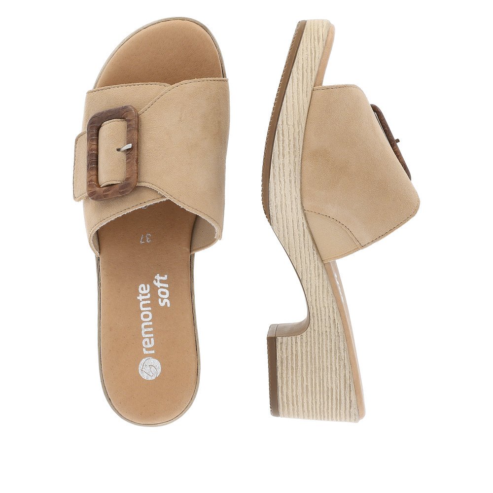 Clay beige remonte women´s mules D0N56-60 with a hook and loop fastener. Shoe from the top, lying.